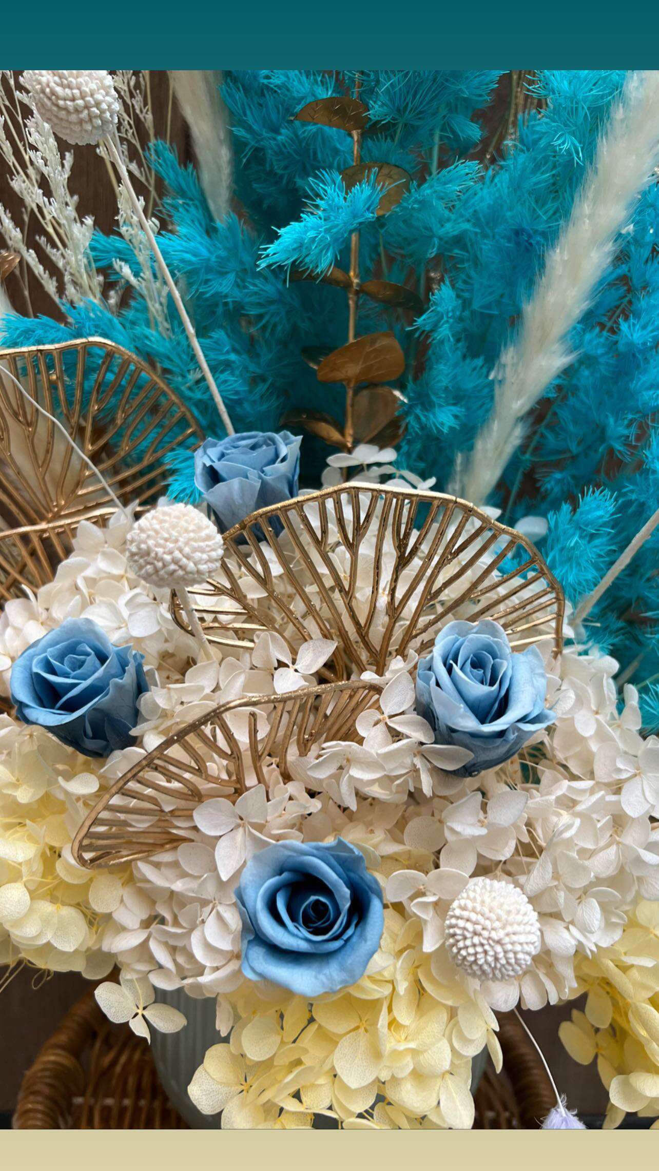 Dried White Hydrangeas with blue roses and leaves