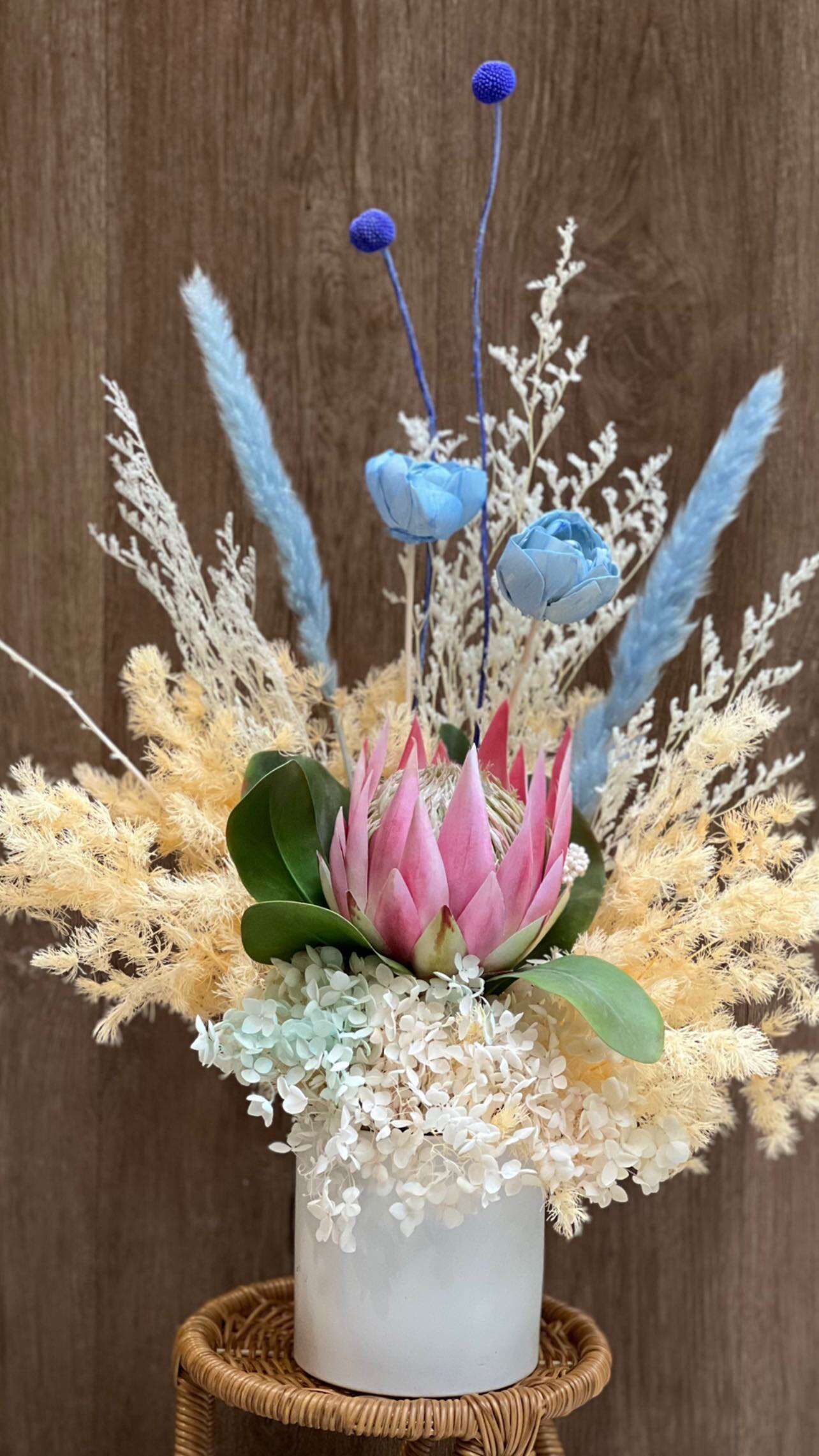 Dried King protea with Blue Roses