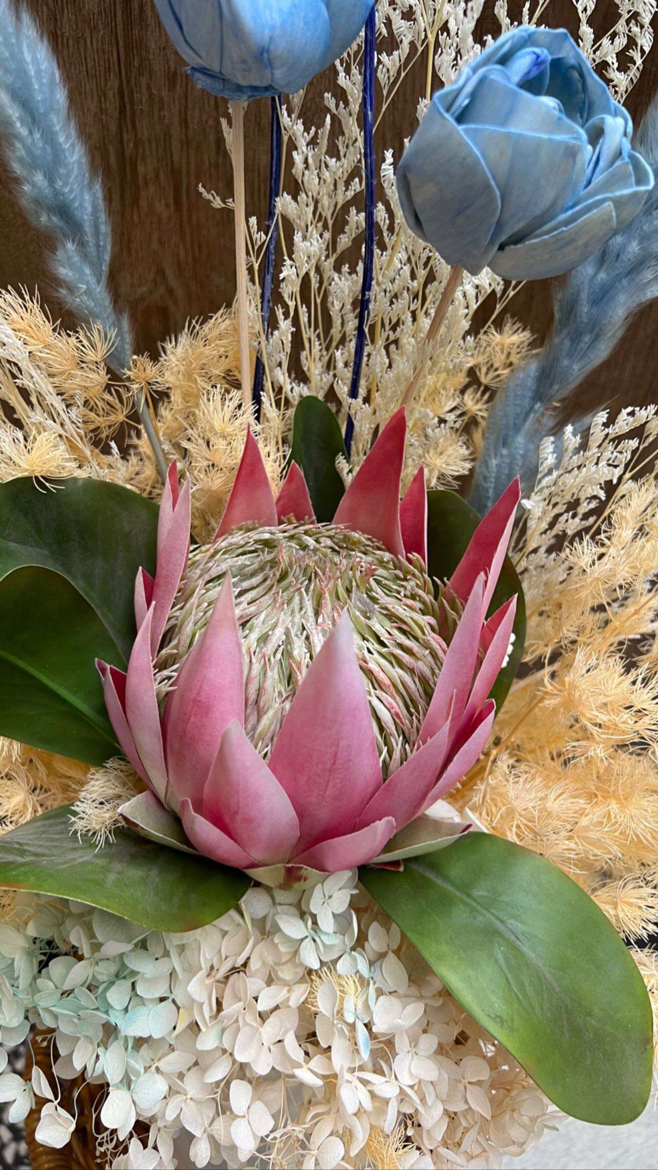 Dried King protea with Blue Roses